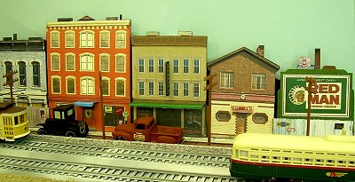 Click to see Howard Lamey's February, 2008 article that describes how to use our store front grahics to make a believable downtown district in any scale.