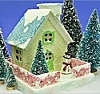 Click to learn how to build vintage-style glittered pasteboard buildings.