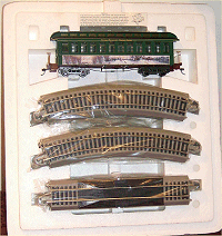Usually the third shipment includes an oval of track. Other shipments include the power supply and additional accessories. Click for bigger photo.