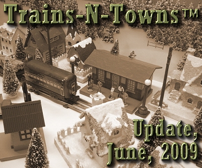 The official e-newsletter of Big Indoor Trains<sup><small>TM</small></sup> and Big Christmas Trains<sup><small>TM</small></sup>. You have to admit - Howard's photo of his vintage-style recreations is awfully convincing. Click to see the same photo in color. The lamp posts and watchman's shanty are described in new articles this month.