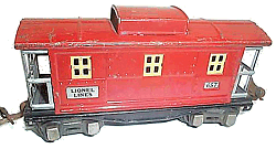 This early 1900s Standard Gauge Lionel caboose uses raised detail and window inserts to provide a 3-D look.